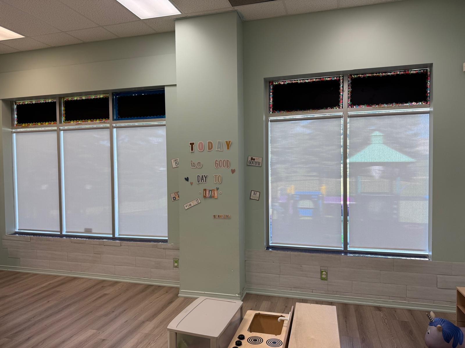 GTA commercial roller shades installed in classroom windows