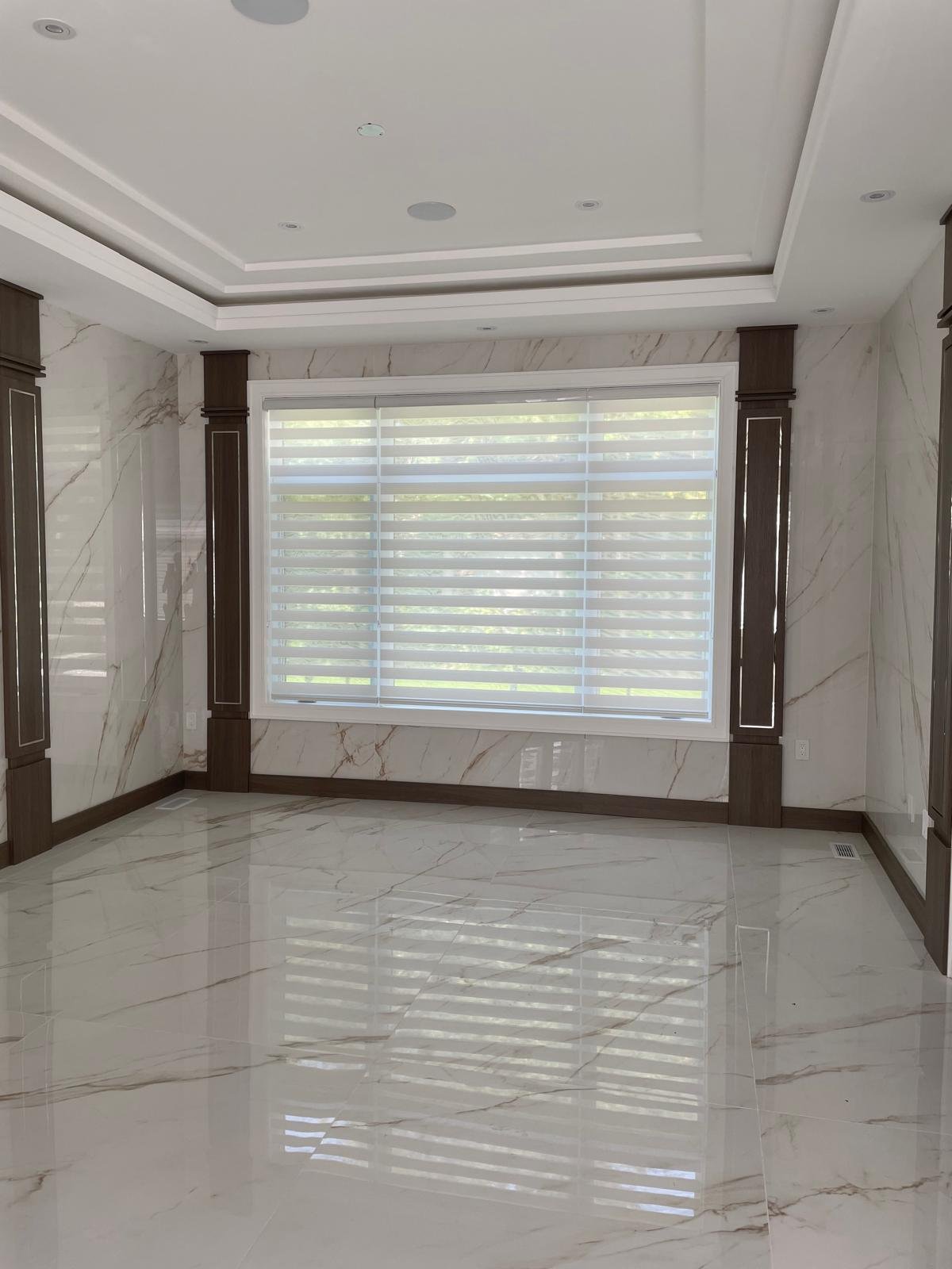 Toronto bay window horizontal blinds installation for a bright living space