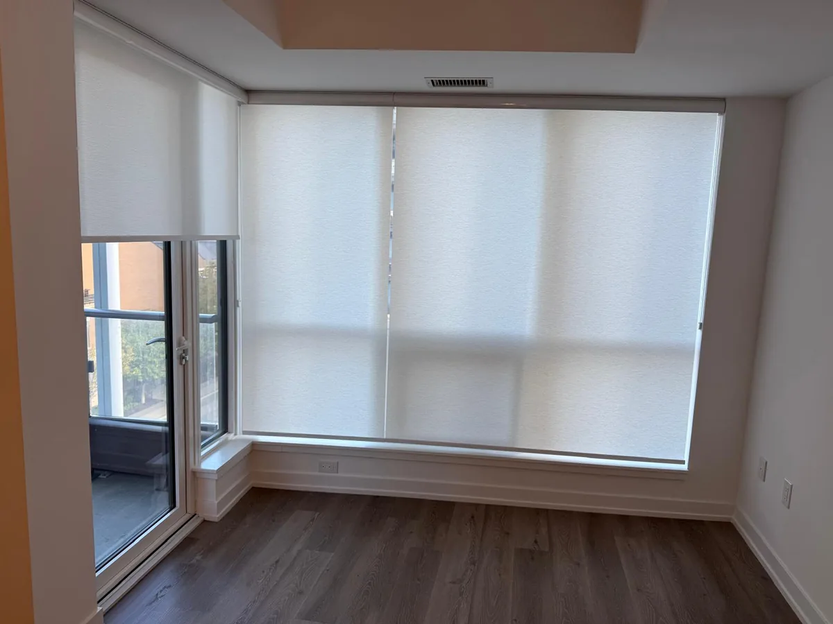 floor-to-ceiling roller shades for a North York condo window wall