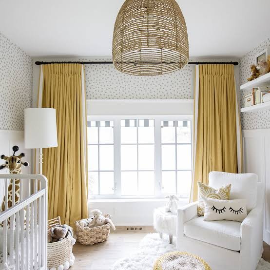 Custom drapery panels framing a window