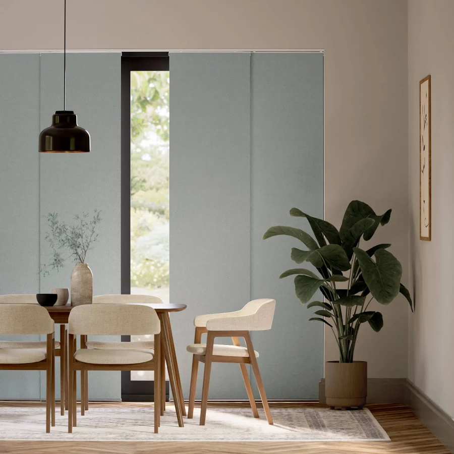 Panel track blinds for a wide modern window