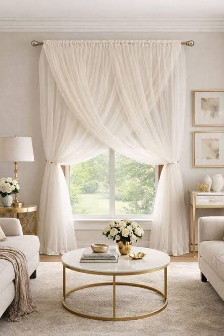 Sheer drapery in a bright dining room